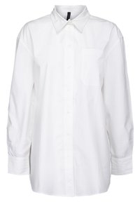 Camicia bianca in cotone con bottoni, caratterizzata da un colletto classico, maniche lunghe, una tasca sul petto e una vestibilità rilassata. Tessuto liscio, senza fantasia.