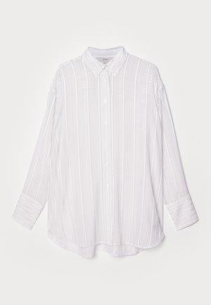 Balts garām piedurknēm krekls ar vertikālu gaiši pelēku svītru, ar pogām aizdaram un pakarināmām piedurknēm. Mīksta auduma, nedaudz pārspīlēta piegrieztne.