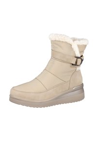 Bota de invierno beige hasta el tobillo con suela acolchada, forro de pelo sintético en la parte superior y una correa decorativa con un hebilla de metal en el lado.