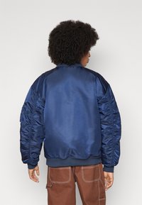 Alpha Industries UNISEX - Bombejakke - ultra navy
