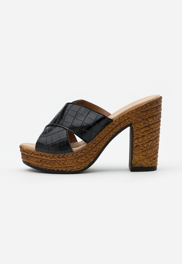 Korolliset pistokkaat - black