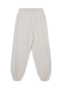 Helle beige Hosen mit einem elastischen Bund, seitlichen Taschen, gerafften Bündchen und einer glatten Textur, entworfen für einen bequemen Sitz und einfache Handhabung.