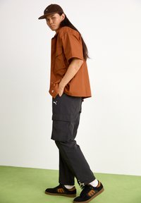 Puma STATEMENT  PANTS - Cargobroek - black