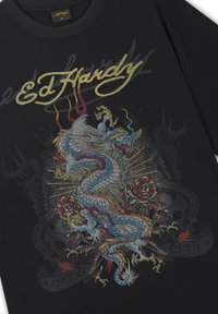 Black Ed Hardy shirt with colorful dragon, red roses, and golden script logo across the chest.