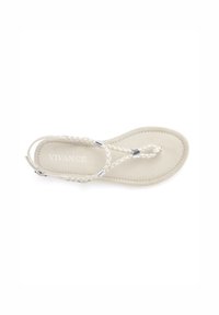 Light beige sandal with braided straps and a smooth, soft sole. Features metallic accents where straps meet the sole. Brand name printed on insole.