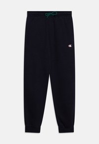 Pantaloni della tuta navy realizzati in tessuto morbido, con vita elasticizzata e cordino verde, e polsini elasticizzati. Piccolo logo sull'anca.