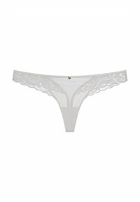 White lace thong underwear featuring floral lace trim, mesh fabric, and a small decorative gold accent at the center front.
