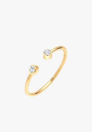 Justerbar ring i guld-tone med to runde klare sten i hver ende. Fremstillet af 925 sterling sølv, med en glat, poleret overflade.