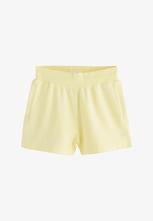 Hellgelbe Freizeitshorts mit geripptem elastischem Bund, Seitentaschen und dezentem Markenlogo am unteren linken Bein.