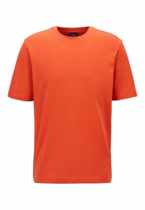 Orange short-sleeve crewneck t-shirt with subtle "BOSS" logo centered on the chest, made of smooth cotton fabric.