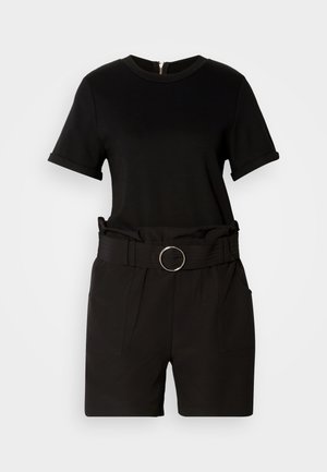 Black short-sleeve jumpsuit with a round neckline, cinched waist using a fabric belt with a round metallic buckle, and side pockets.