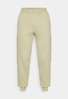 TAPE SWEATPANTS - Verryttelyhousut - lux army
