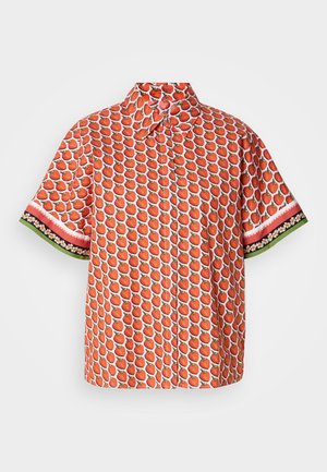 Short-sleeve shirt in red fabric featuring a strawberry pattern, with contrasting floral and striped accents on the sleeves.