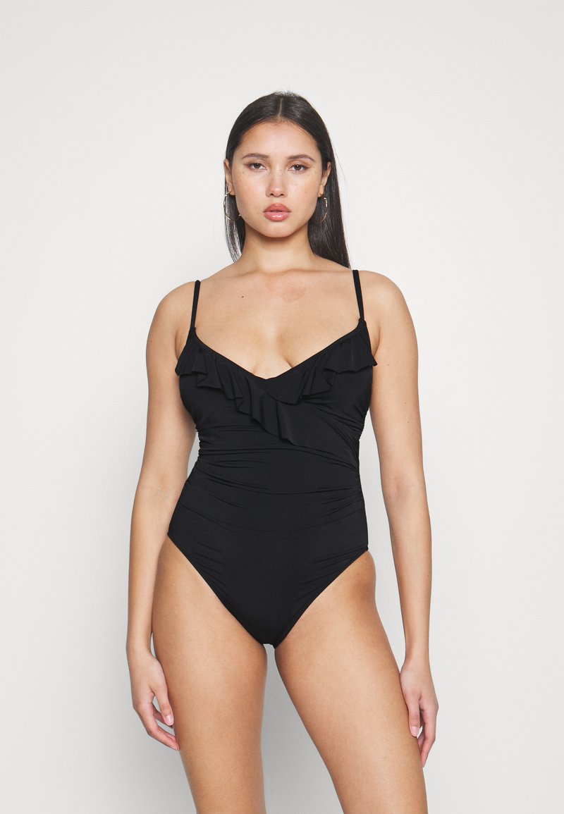 Maillot de bain une pièce noir avec un détail froncé le long du décolleté, des fines bretelles réglables et un tissu froncé à la taille pour un ajustement flatteur.