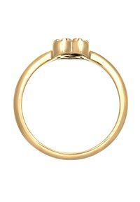 Guld ring med en slät, polerad band, med en dekorativ topp som visar tre upphöjda accenter. Enkel, elegant och klassisk design.