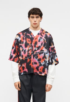 Nike Sportswear, FOOTBALL UNISEX - Triko s potiskem - crimson