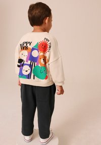 Next BACKPRINT AND JOGGERS SET - Trening - ecru animals