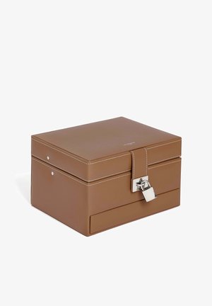 Brown leather storage box with silver hardware, a padlock, and white stitching. Rectangular shape with a smooth texture and minimalistic design.