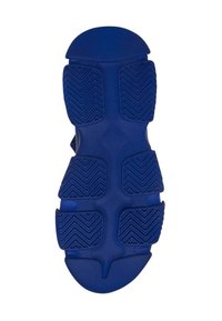 Blue rubber sole with textured grip patterns, featuring herringbone shapes and a smooth toe area, designed for traction and durability.
