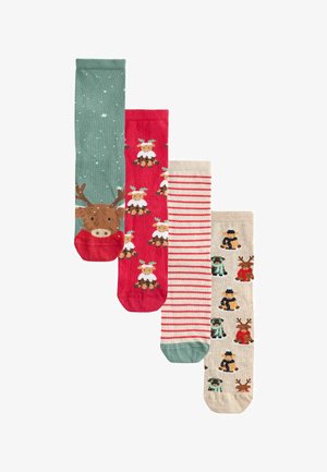 Four pairs of socks: green with reindeer face, red with reindeer pattern, beige with colorful animal illustrations, and striped beige and red.