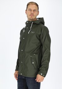 Dark green waterproof jacket with a hood, zipper and snap button closures, side pockets, and contrasting light drawstrings.