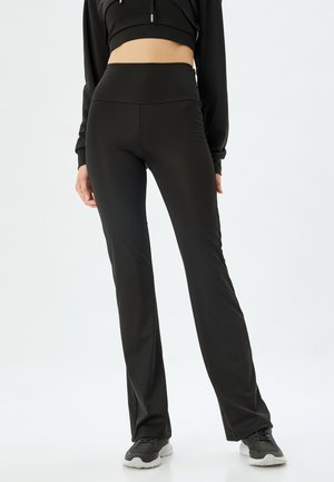 FLARE - Trousers - black
