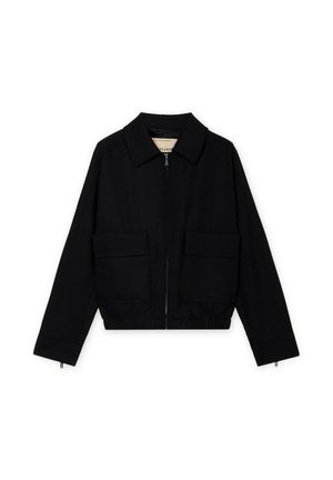 Black cropped jacket with a front zipper, wide collar, two large front flap pockets, and long sleeves with zipper cuffs.