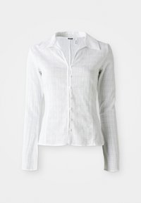 White long-sleeve button-up shirt with a collar, subtle checkered texture, and branded label inside the neckline.