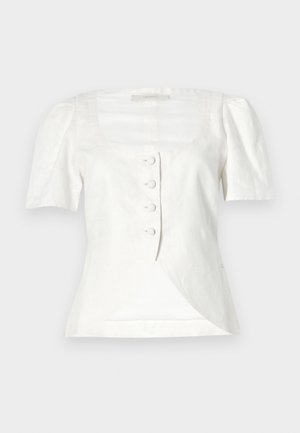 Hvid bluse i linned med korte puffærmer, firkantet udskæring og fem knapper foran. Har et diagonalt draperet frontpanel.