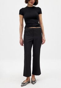CROPPED FLARED MID WAIST  - Hlače - black