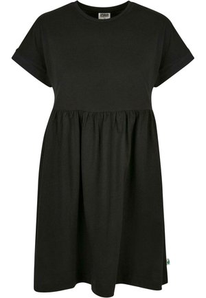 Vestido de algodón negro con mangas cortas, escote redondeado y cintura fruncida. Textura suave, hasta las rodillas, diseño minimalista, detalle de etiqueta verde pequeña.
