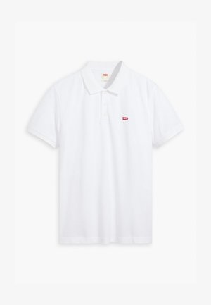 White polo shirt made of cotton. Features a three-button placket, short sleeves, and a small red Levi's logo on the left chest.