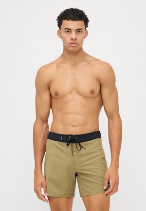 KAIMANA - Swimming shorts - aloe