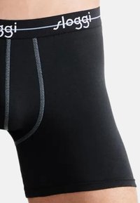 Boxer neri in morbido tessuto, con cuciture grigie a contrasto e una banda con logo bianco in vita.