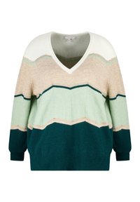 Pull à col en V en matériaux mixtes avec des rayures cream, beige, vert menthe et bleu canard. Coupe oversize avec des poignets côtelés.