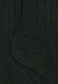 Calze verdi scuro a coste con un motivo a maglia testurizzato, caratterizzate da un tessuto morbido e un design aderente, adatte per un look casual.