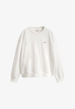 Weißes Sweatshirt mit langen Ärmeln und Rundhalsausschnitt, gerippte Bündchen und Saum, kleines besticktes Logo auf der linken Brust und GANT-Label innen am Kragen.
