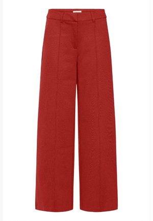 Weit geschnittene Hose aus leuchtend rotem Stoff, mit glatter Textur und vorderen Nähten für ein zusätzliches Detail, ausgestattet mit einem klassischen Bunddesign.
