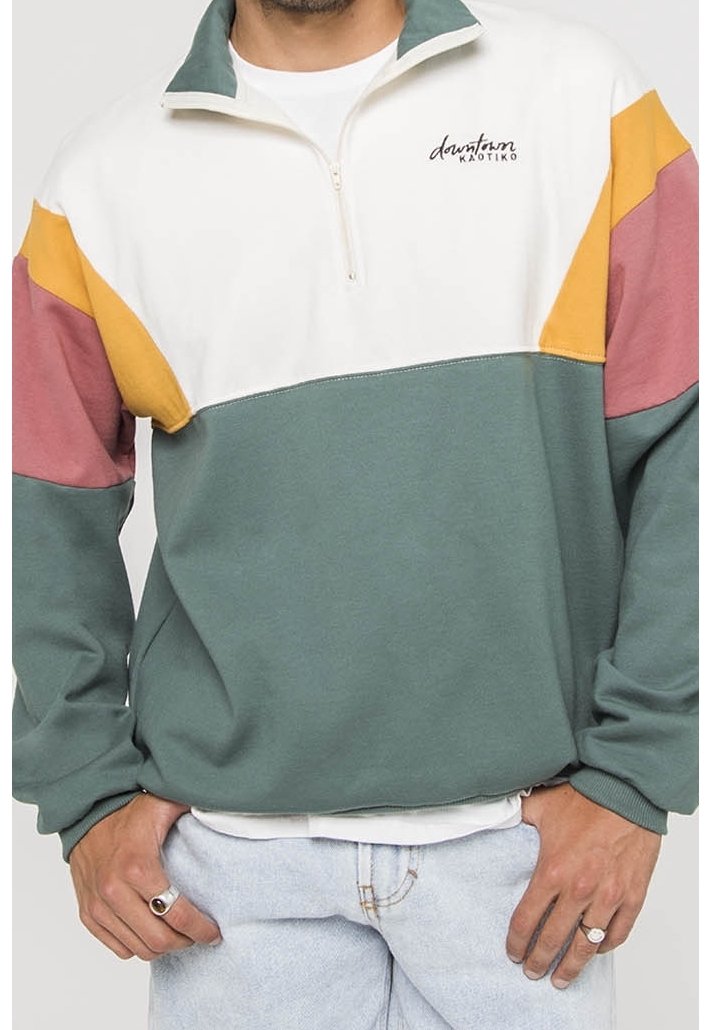 Felpa con mezza zip, caratterizzata da blocchi di colore bianco, giallo, rosa e verde. Materiale morbido e vestibilità rilassata. Logo sul petto.