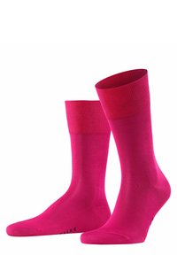 Calze a crew fucsia con una costa, texture liscia e punta rinforzata. Presentano un branding sottile sulla suola.