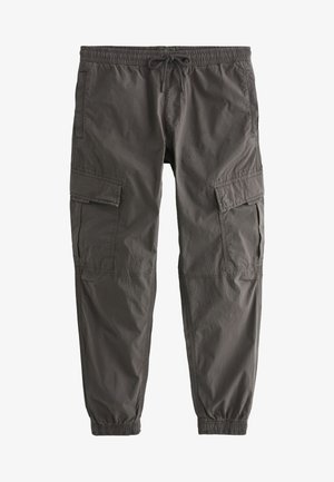 Hallid hallid cargo püksid, millel on elastne vöökoht ja nöör, mitmete küljetaskutega ning kitsenevad sääred.