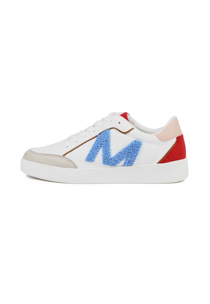 White sneakers with gray suede accents, blue fuzzy "M" logo, red heel, and light pink tongue. Smooth leather upper and rubber sole.