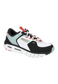 Chaussure de sport noire et blanche avec une tige en maille, des accents rouges, un col rembourré et une semelle blanche épaisse avec un coussin d'air visible.