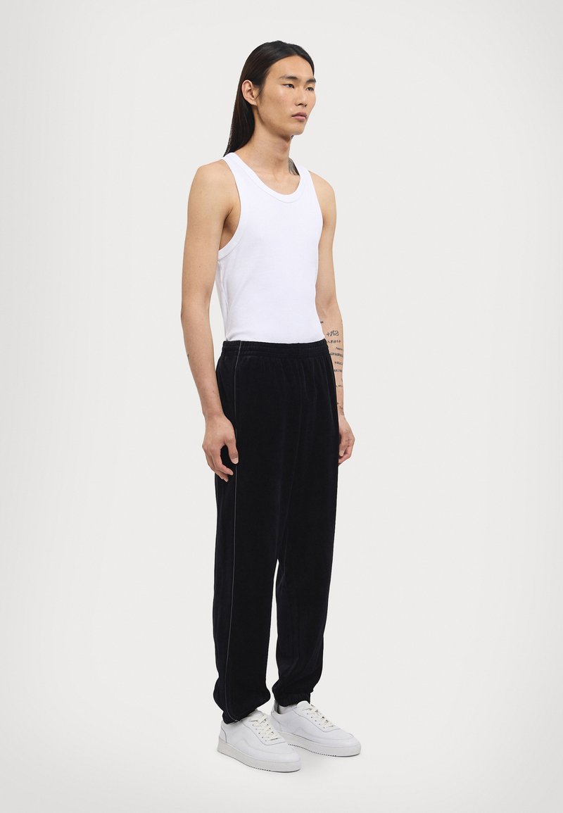 Noon Goons DIAL TRACKPANT - Tracksuit bottoms - black
