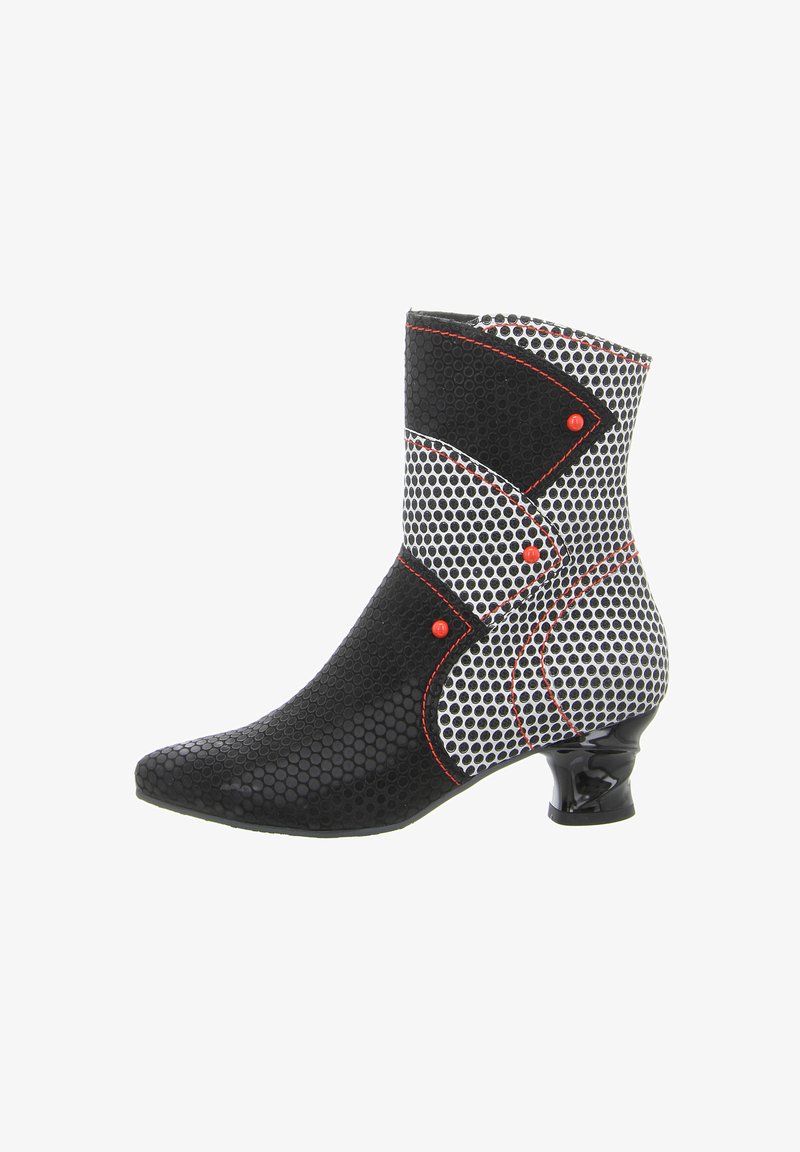 Black and white ankle boot with textured hexagonal pattern, accentuated by red stitching and round embellishments, featuring a glossy heel.