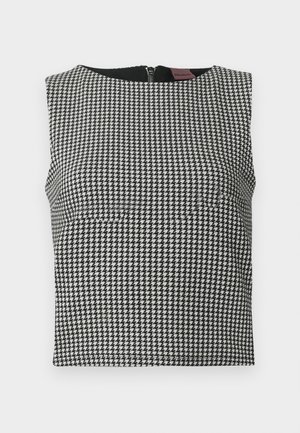 Černobílý dámský top bez rukávů s motivem houndstooth, kulatým výstřihem a zipem na zádech. Vyrobeno z texturované látky.