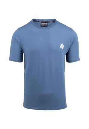 Blauw T-shirt met korte mouwen van zachte katoen. Heeft een ronde halslijn en een klein wit logo op de linkerkant van de borst. Eenvoudig ontwerp.