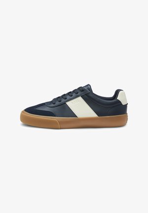Navy blue sneaker with a smooth leather upper, white accent stripe, and rubber gum sole. Features flat laces and a rounded toe design.