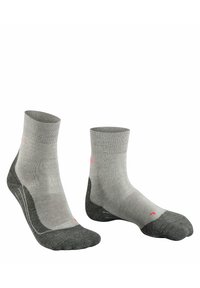 Chaussettes de cheville grises avec des bords à côtes, présentant un talon et un orteil en gris plus foncé. Comprend des accents rose subtils. Fabriquées dans un matériau doux et texturé.