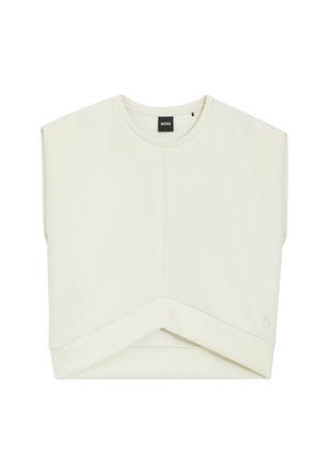 Haut sans manches couleur crème avec un col rond, des épaules rembourrées et un ourlet asymétrique plié, avec une petite étiquette logo BOSS.